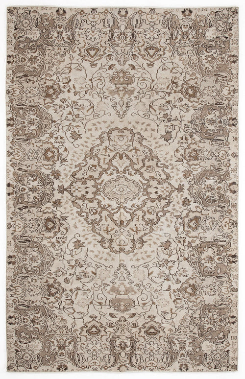 Load image 1 in gallery view. Beige and taupe area rug with a distressed traditional floral medallion pattern and ornate border.