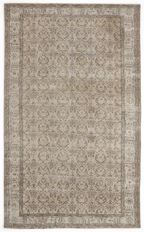 Load image 1 in gallery view. Beige and grey distressed rug with a repeating geometric medallion pattern and a wide decorative border.