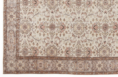 Load image 1 in gallery view. Beige and muted rose vintage-style rug with a distressed floral medallion pattern and a wide decorative border.