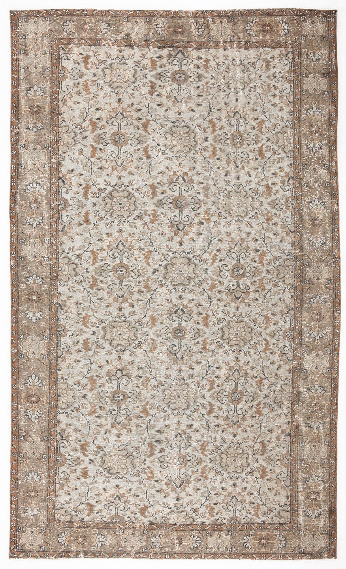 Beige and terracotta traditional rug with a distressed floral medallion pattern and a wide decorative border.
