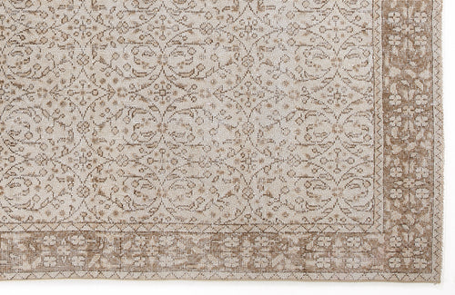 Load image 1 in gallery view. Beige and cream rug with a traditional floral lattice pattern and a wide decorative border.