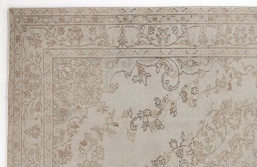 Load image 1 in gallery view. Beige and light blue traditional rug with a distressed floral medallion pattern and a detailed border.