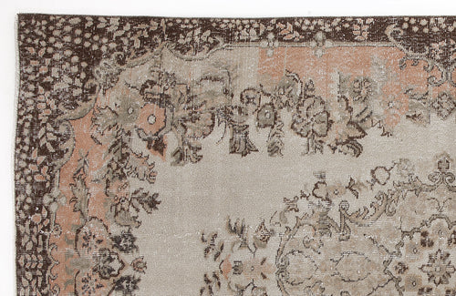 Load image 1 in gallery view. Distressed beige, brown, and muted peach rug with a traditional floral medallion pattern and ornate border.