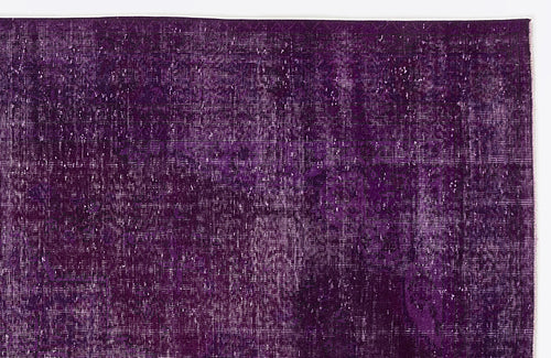 Load image 1 in gallery view. Deep purple vintage-style rug with a distressed, overdyed texture and faint traditional medallion pattern.