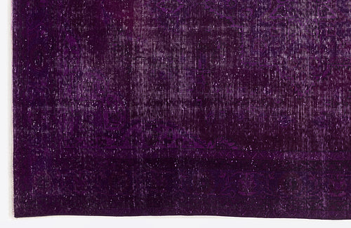 Load image 1 in gallery view. Deep purple vintage-style rug with a distressed, faded traditional medallion pattern.