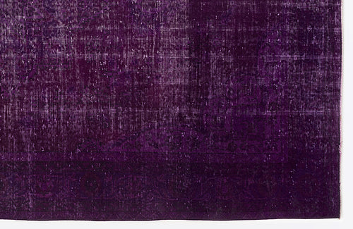 Load image 1 in gallery view. Deep purple vintage-style rug with a distressed, faded traditional medallion pattern.