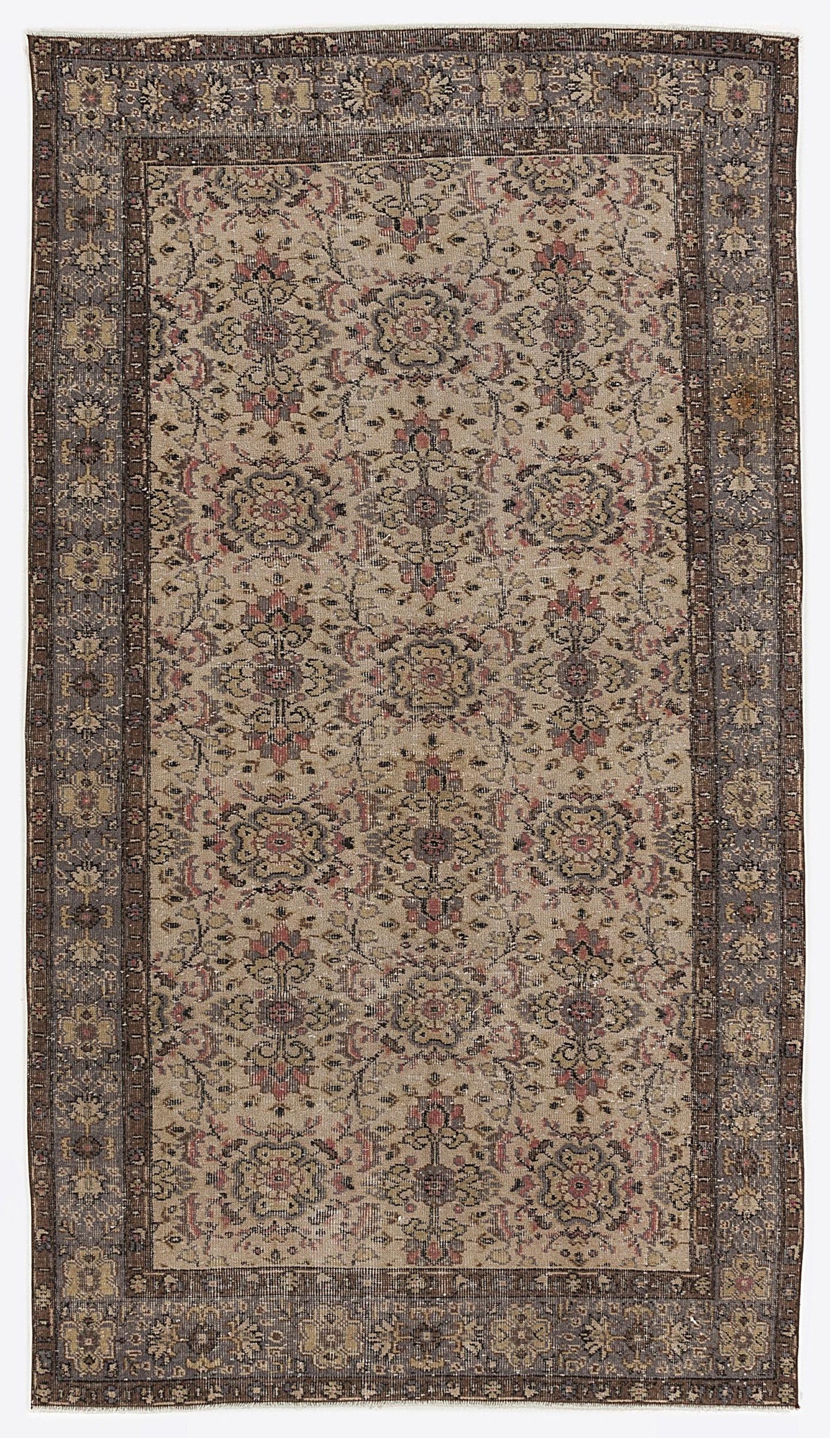 Beige and charcoal traditional rug with a repeating floral medallion pattern and a wide, ornate border.