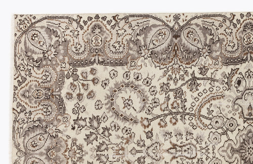 Load image 1 in gallery view. Cream, taupe, and brown traditional rug with an intricate paisley and floral medallion pattern.