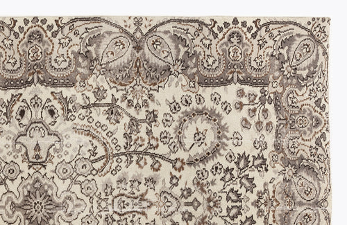 Load image 1 in gallery view. Cream, grey, and brown traditional rug with an intricate floral paisley pattern and a decorative border.