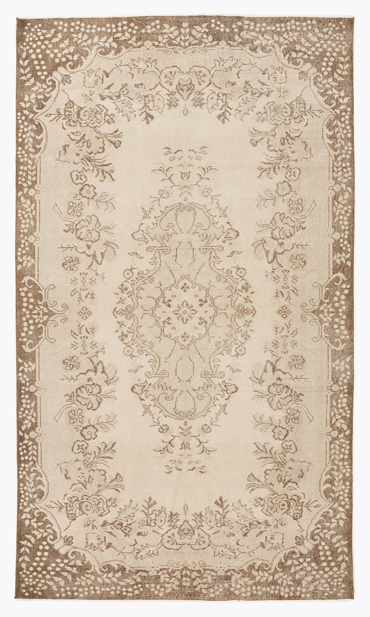Beige and brown traditional rug with a central floral medallion and ornate botanical border.