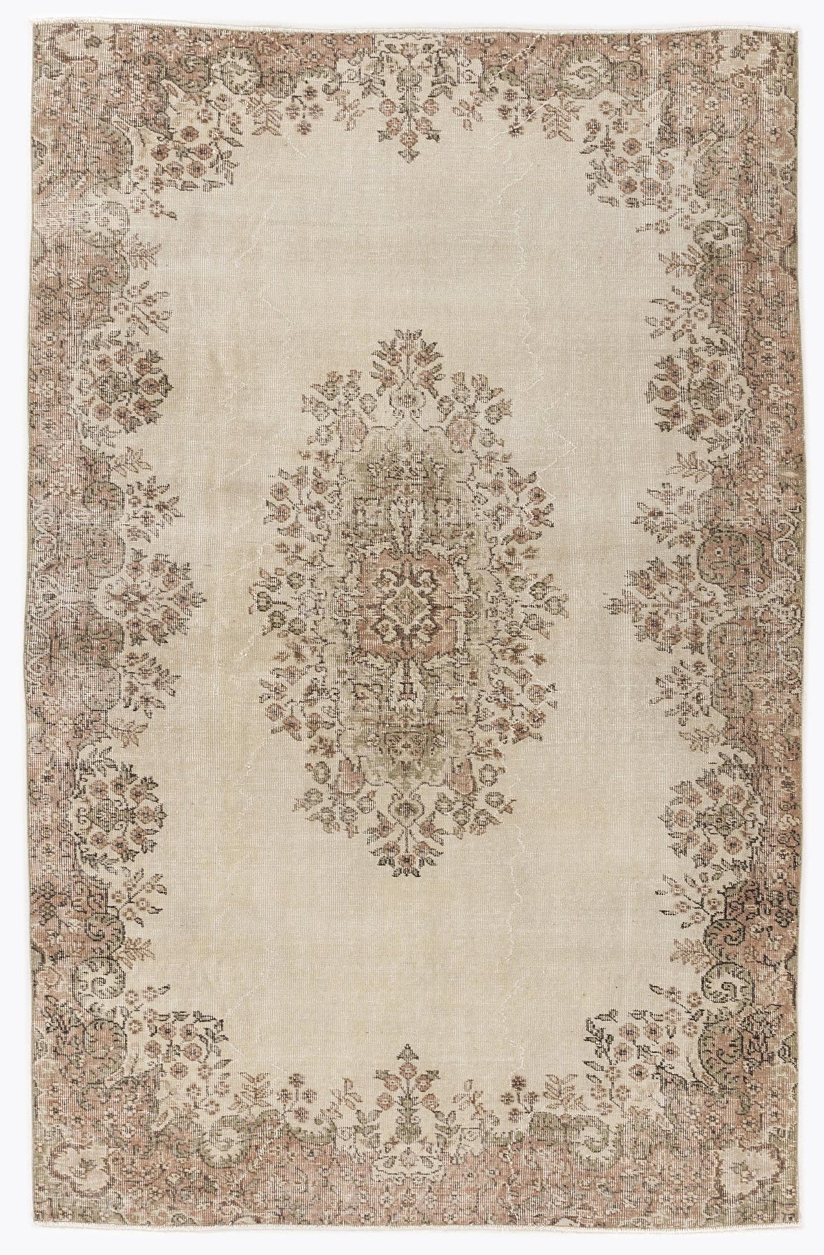 Beige vintage-style rug with a central floral medallion and ornate botanical border in muted pink and sage green tones.