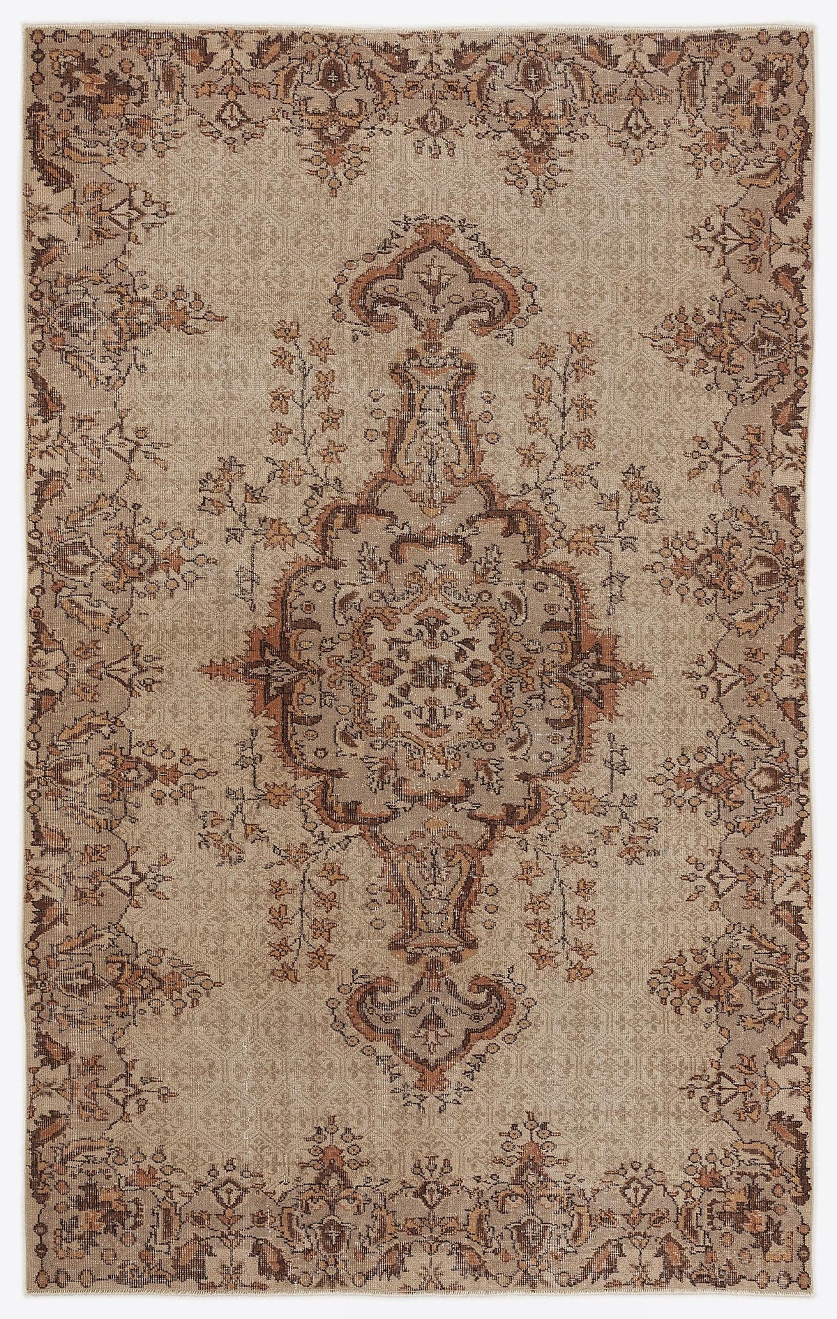 Beige and brown traditional rug with a central floral medallion and distressed vintage-style pattern.