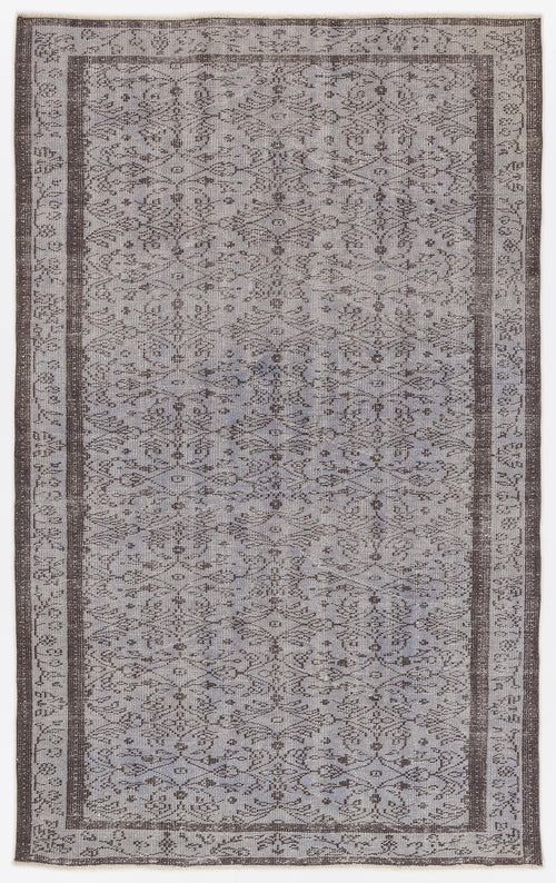 Load image 1 in gallery view. Grey and charcoal vintage-style rug with a distressed floral medallion pattern and a wide decorative border.