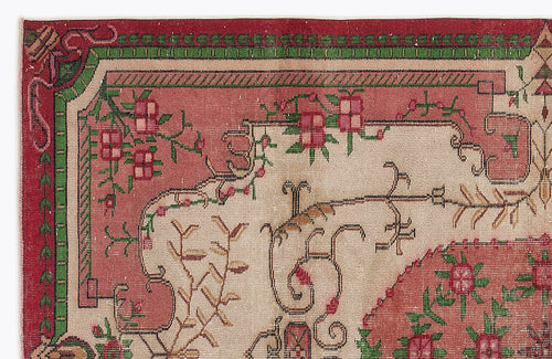 Load image 1 in gallery view. Vintage-style rug with a beige center, red border, and green and pink floral vine motifs.