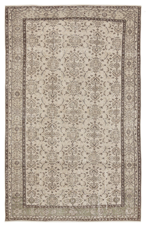 Load image 1 in gallery view. Beige and brown vintage-style rug with a distressed floral medallion pattern and a decorative border.