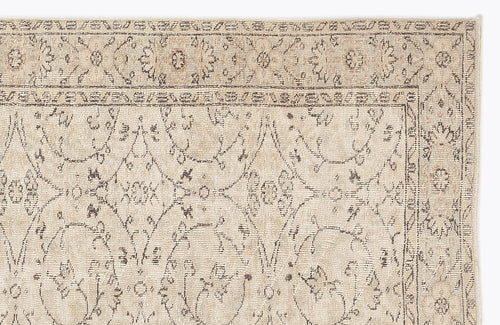 Load image 1 in gallery view. Beige rug with a dark grey traditional floral medallion pattern and a detailed border on a white background.