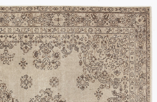 Load image 1 in gallery view. Beige and brown traditional rug with a distressed floral medallion pattern and a detailed geometric border.