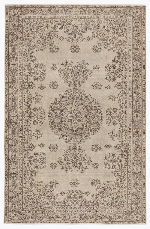 Load image 1 in gallery view. Beige and brown traditional rug with a distressed central medallion and ornate floral border.