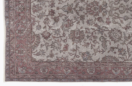 Load image 1 in gallery view. Distressed grey and muted burgundy rug with a traditional floral medallion pattern and a detailed border.