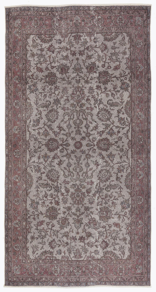 Load image 1 in gallery view. Distressed grey and burgundy rug with a traditional floral medallion pattern and a wide decorative border.