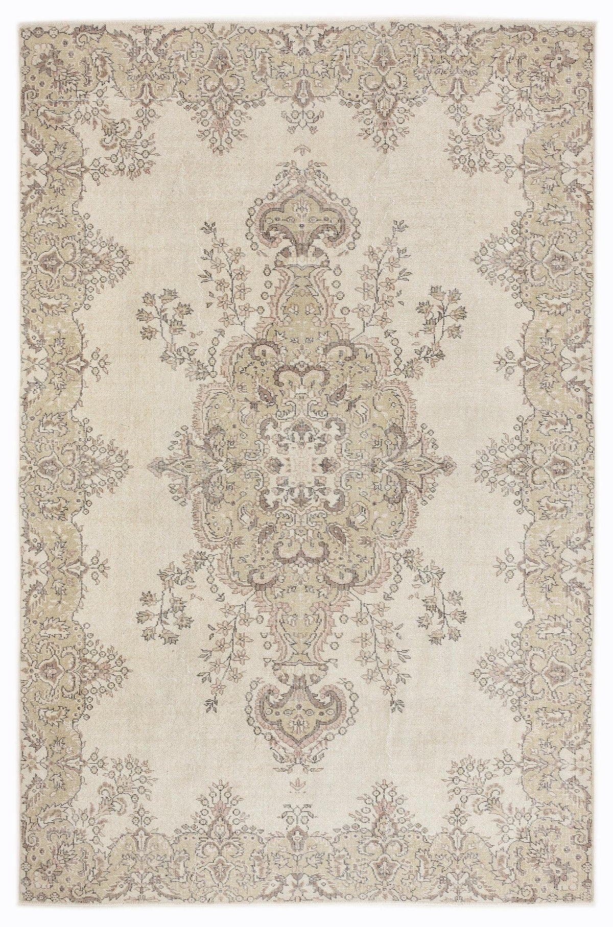 Beige and taupe traditional rug with a central floral medallion and ornate border on a white background.
