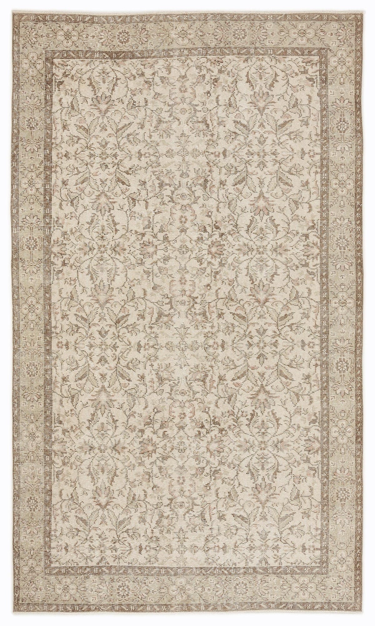 Beige and taupe traditional rug with a distressed floral medallion pattern and a detailed border.