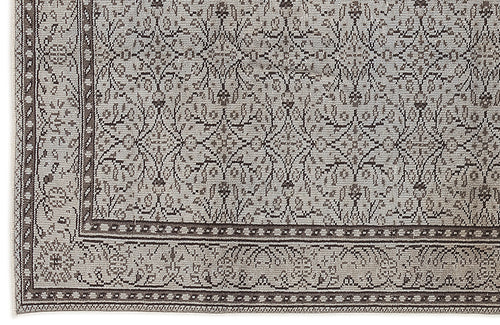 Load image 1 in gallery view. Grey and charcoal rug with a traditional floral medallion pattern and a detailed geometric border.