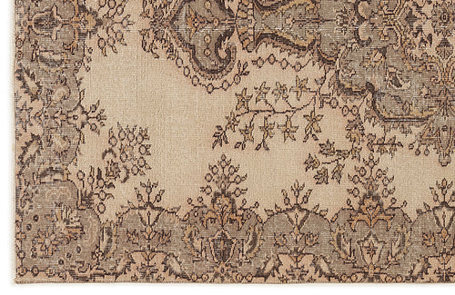 Load image 1 in gallery view. Beige and grey traditional rug with a distressed floral medallion pattern and intricate border detail.
