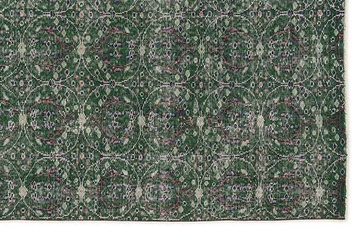 Load image 1 in gallery view. Dark green rug with a repeating circular medallion pattern in distressed white, blue, and pink accents.
