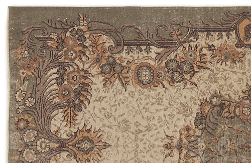 Load image 1 in gallery view. Olive green and beige rug with a distressed floral medallion pattern and intricate scrollwork border.