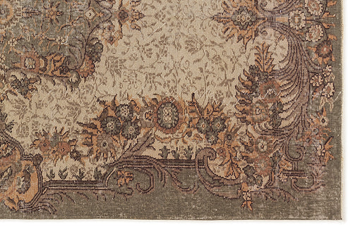 Load image 1 in gallery view. Distressed olive green and terracotta floral medallion rug with a traditional ornate border.