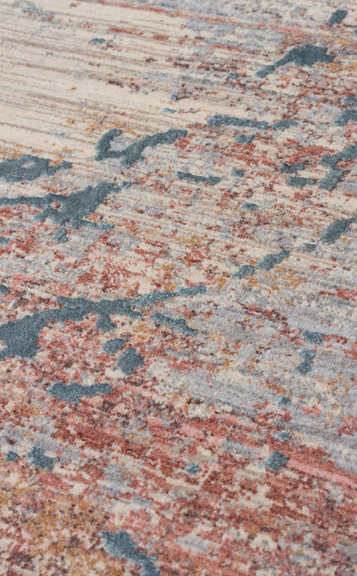 Load image 1 in gallery view. Abstract rug with a distressed texture in shades of cream, rust orange, and slate blue.