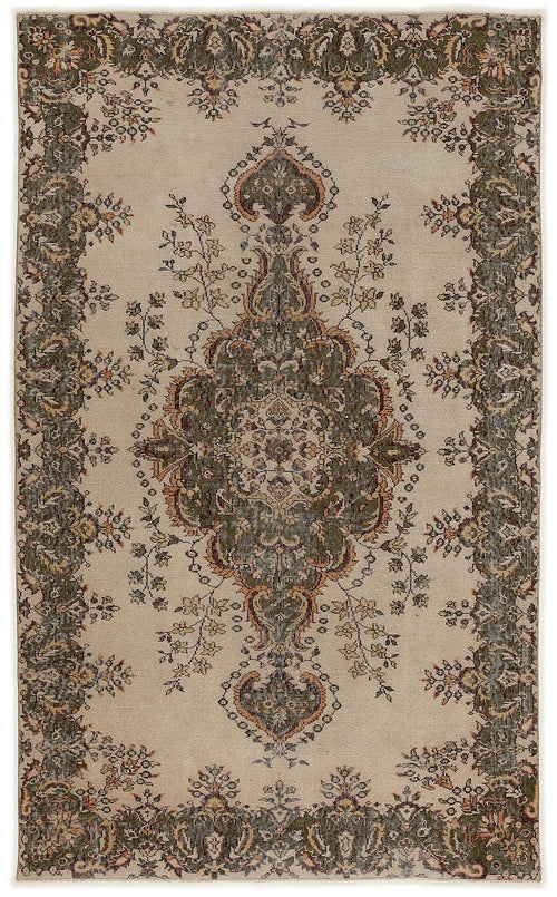 Load image 1 in gallery view. Beige traditional rug with a central olive green floral medallion and ornate border pattern.