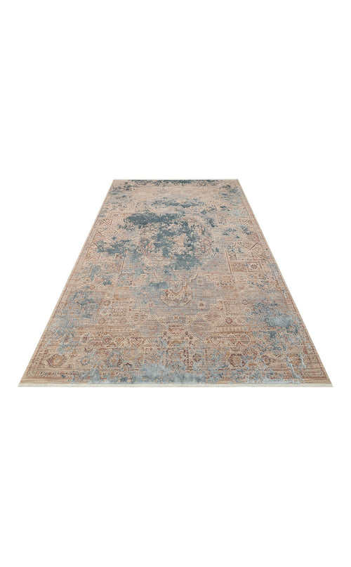 Load image 1 in gallery view. Beige and blue distressed area rug with a faded traditional medallion pattern on a white background.