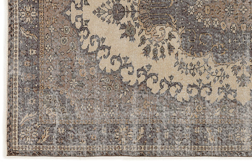 Load image 1 in gallery view. Charcoal and beige rug with a distressed traditional medallion pattern and a detailed border.