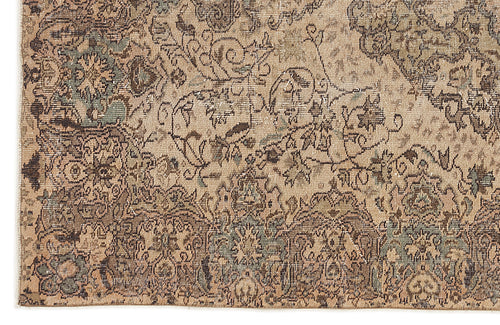 Load image 1 in gallery view. Distressed beige, brown, and sage green rug with a traditional floral medallion pattern.