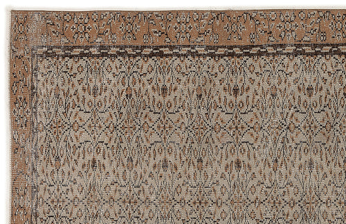 Load image 1 in gallery view. Brown and beige rug with a distressed, intricate floral medallion pattern and a decorative border.