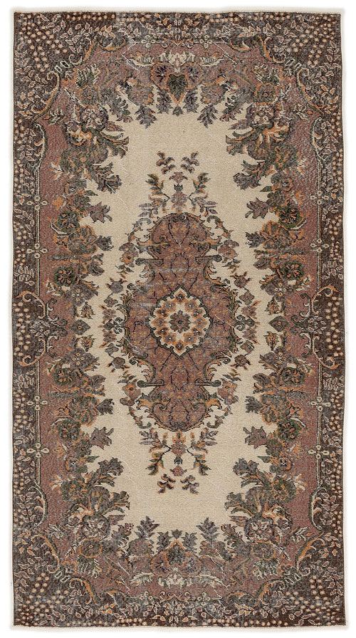 Load image 1 in gallery view. Cream and brown traditional rug with a central floral medallion and ornate border on a white background.