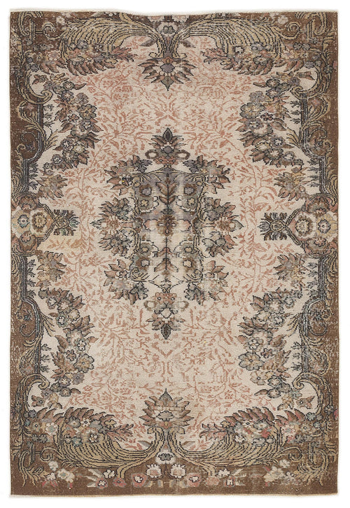 Load image 1 in gallery view. Distressed beige and brown rug with a central floral medallion and ornate botanical border.