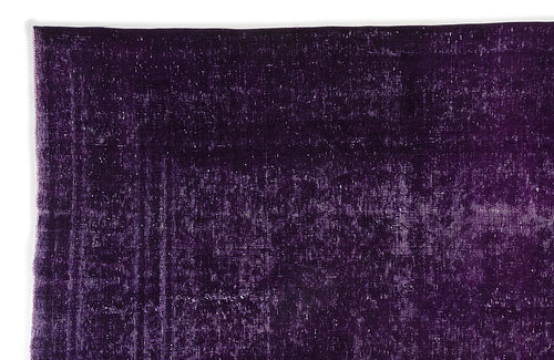 Load image 1 in gallery view. Deep purple vintage-style rug with a distressed, faded texture on a white background.