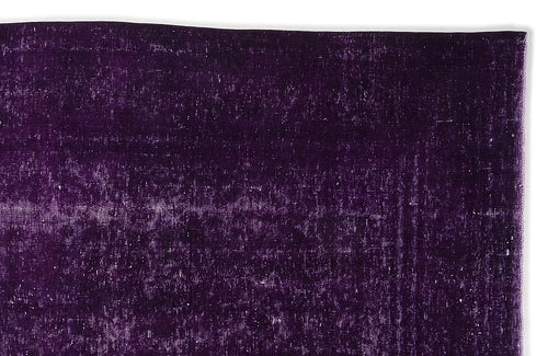 Load image 1 in gallery view. Deep purple overdyed vintage rug with a distressed, textured finish.