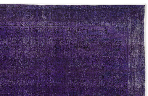 Load image 1 in gallery view. Deep purple vintage-style rug with a faint, distressed traditional medallion pattern on a white background.