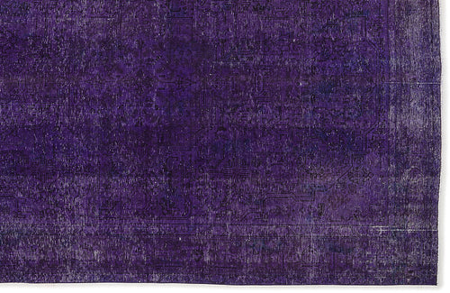 Load image 1 in gallery view. Deep purple vintage-style rug with a faint, distressed traditional medallion pattern and a bordered edge.