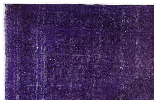 Load image 1 in gallery view. Deep purple vintage-style rug with a faded, distressed traditional border and central medallion pattern.