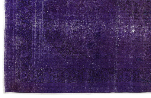 Load image 1 in gallery view. Deep purple vintage-style rug with a distressed, faded traditional border pattern.