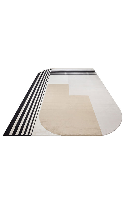 Bild 1 in Galerieansicht laden. Black, beige, and cream area rug with a rounded edge and a geometric pattern of bold stripes and solid color blocks.