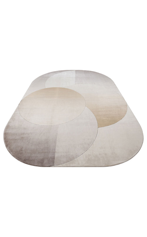 Load image 1 in gallery view. Oval rug in shades of beige and grey featuring an overlapping circular geometric pattern.