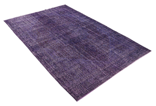 Load image 1 in gallery view. Deep purple distressed rug with a faded traditional medallion pattern on a white background.