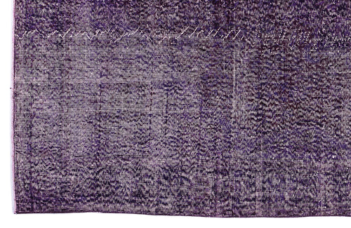Load image 1 in gallery view. Deep purple vintage-style rug with a distressed, faded texture and subtle white linear detailing.