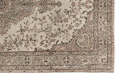Load image 1 in gallery view. Beige and muted pink traditional rug with a distressed floral medallion pattern and intricate border.
